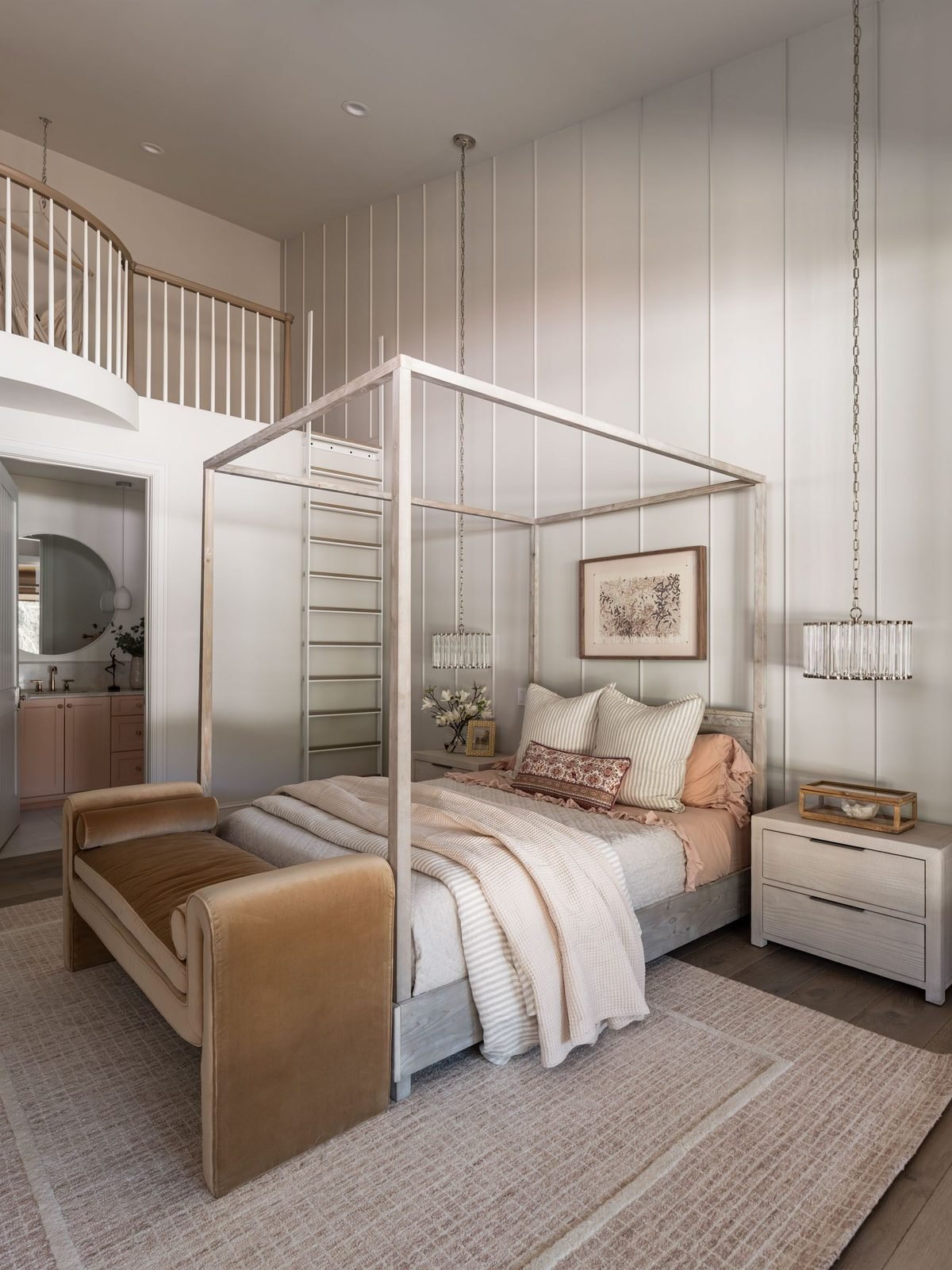 Girl's bedroom with canopy bed and daybed