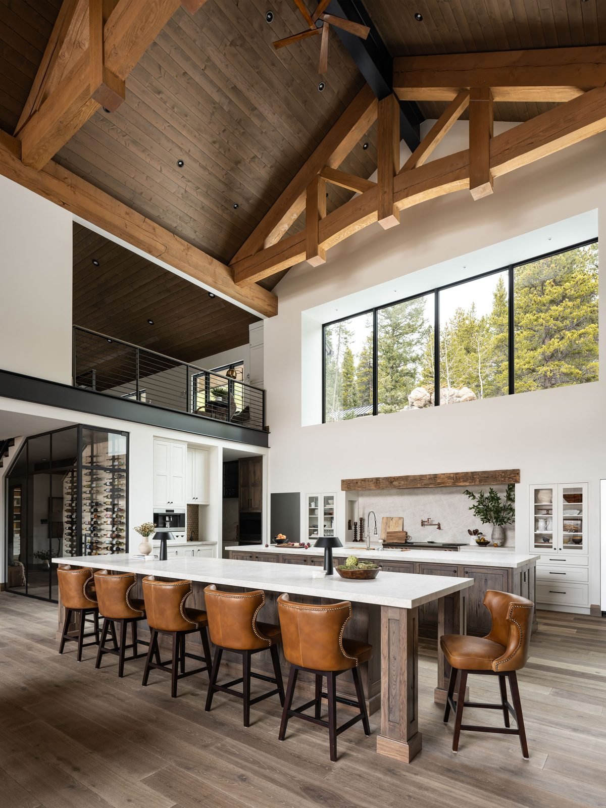 Kitchen bar and butler's pantry with dark cabinetry