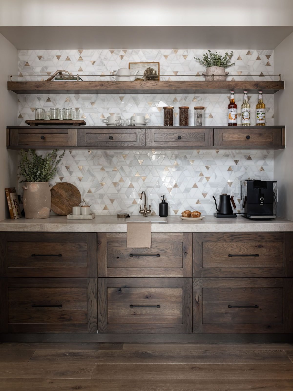 Primary bedroom nook with dark wood cabinetry